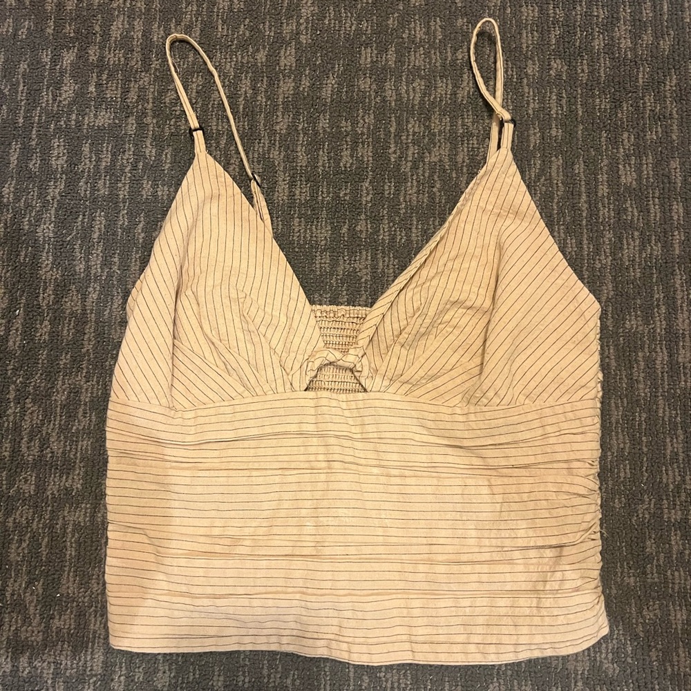 Slightly cropped striped going out top